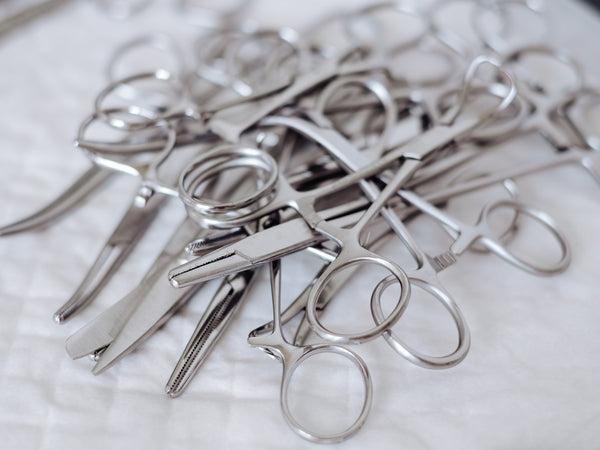 a group of silver scissors